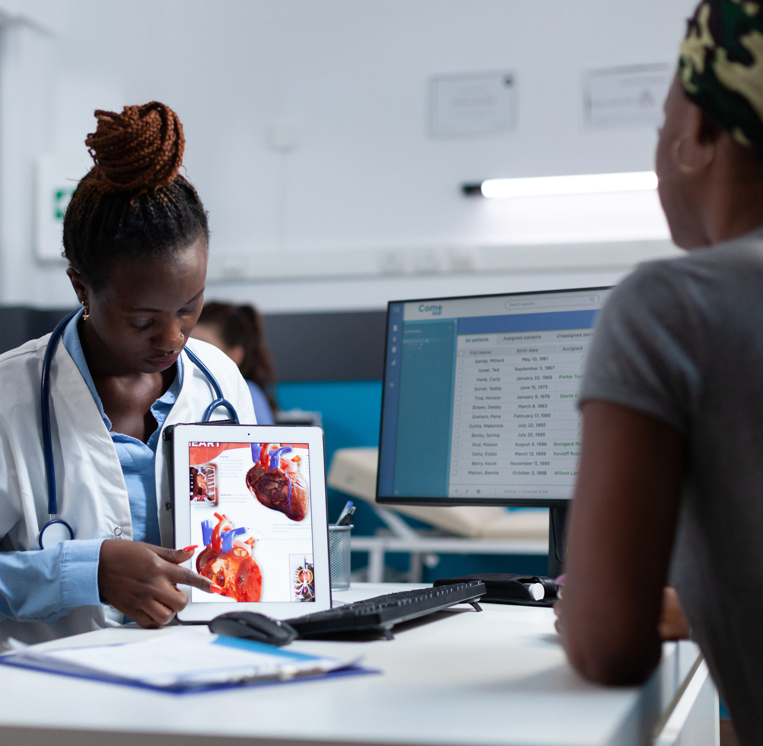 African american specialist cardiologist explaining heart radiography expertise