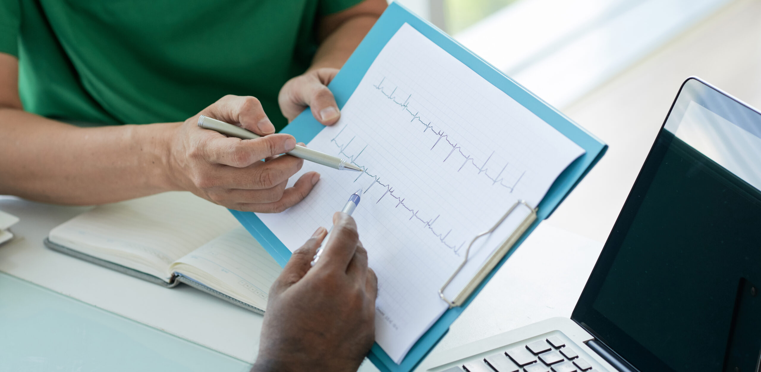 doctors-looking-cardiogram-their-patient(1)